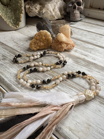 Golden Grounding Mala – Black Onyx, Crazy Lace Agate & Golden Rutilated Quartz with Sari Silk Tassel