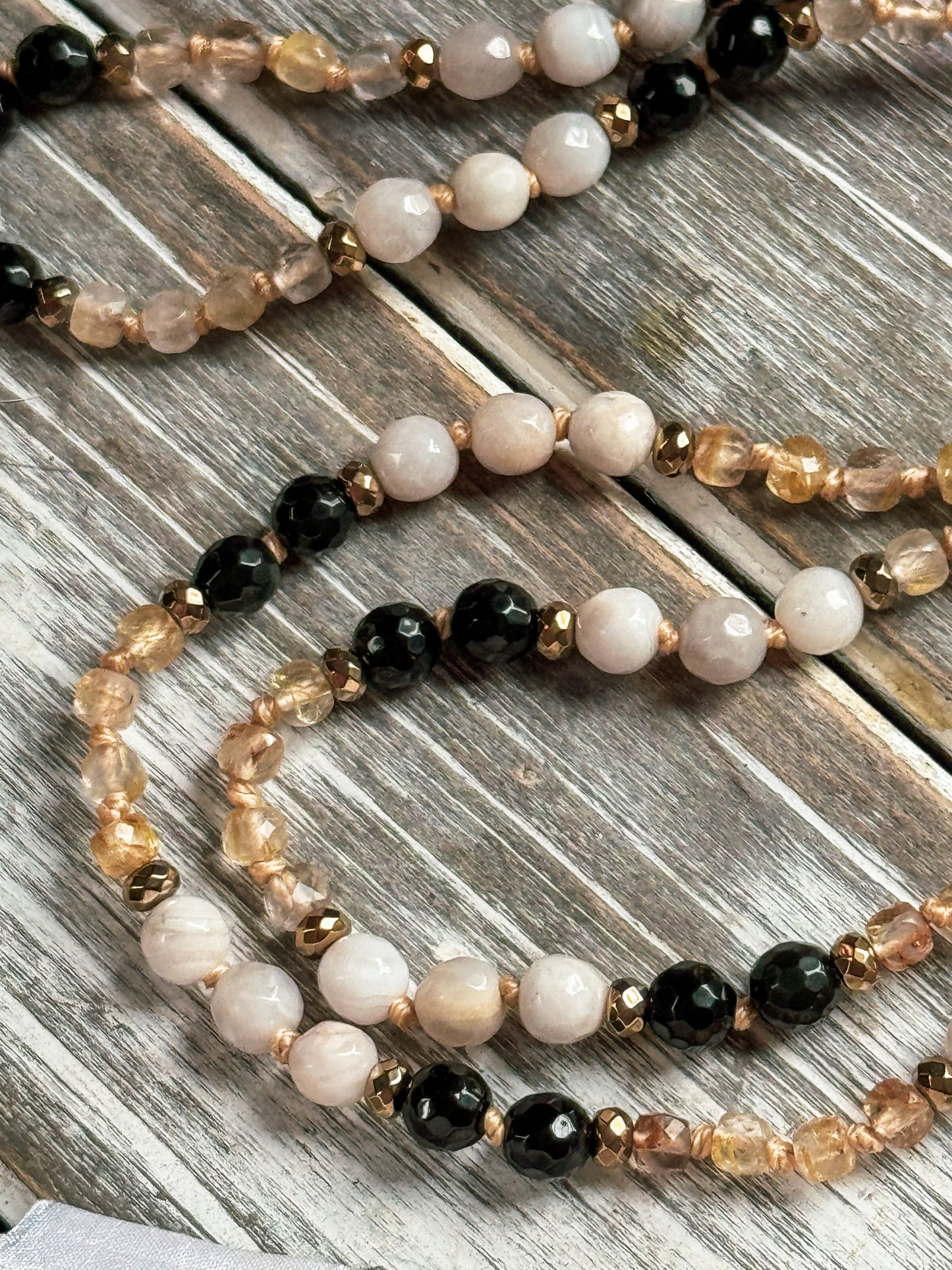 Golden Grounding Mala – Black Onyx, Crazy Lace Agate & Golden Rutilated Quartz with Sari Silk Tassel