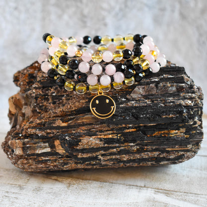 Happiness Matters 108 Bead Mala Wrap - Citrine, Rose Quartz and Onyx with Black and Gold smiley face charm