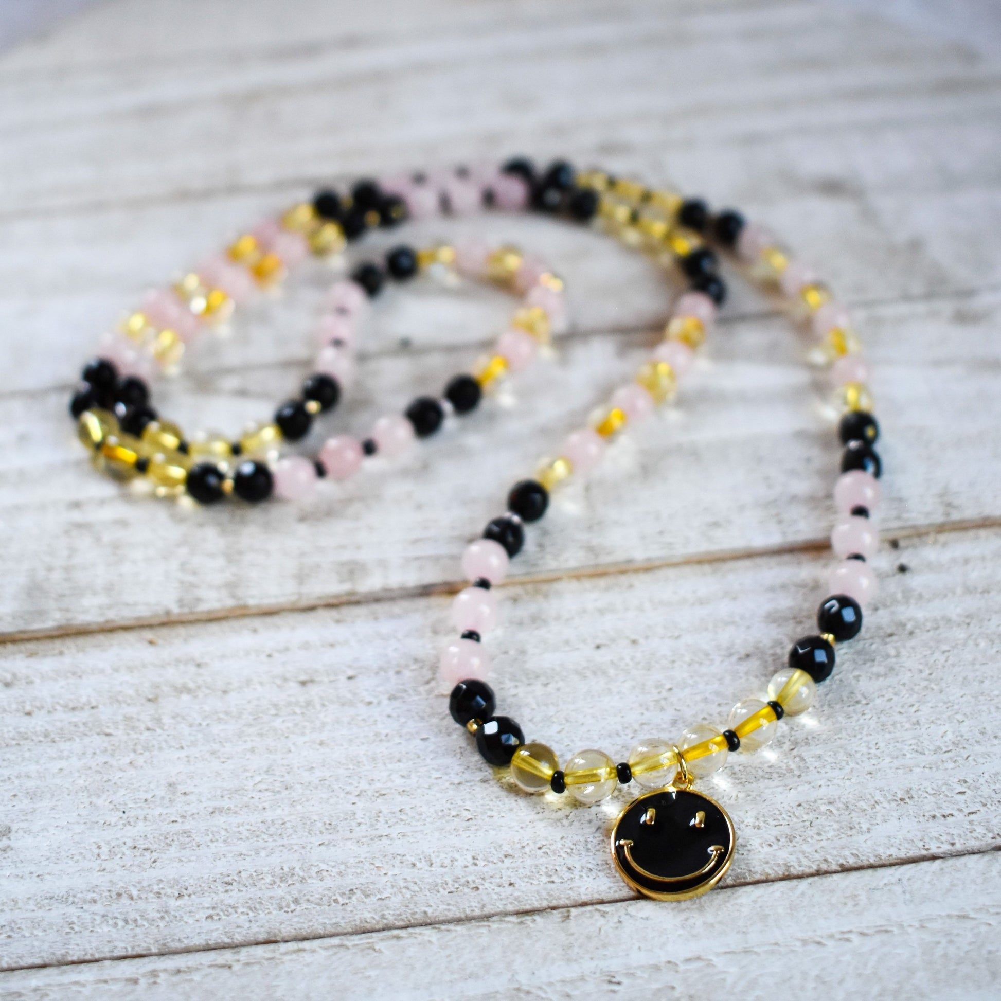 Happiness Matters 108 Bead Mala Wrap - Citrine, Rose Quartz and Onyx with Black and Gold smiley face charm